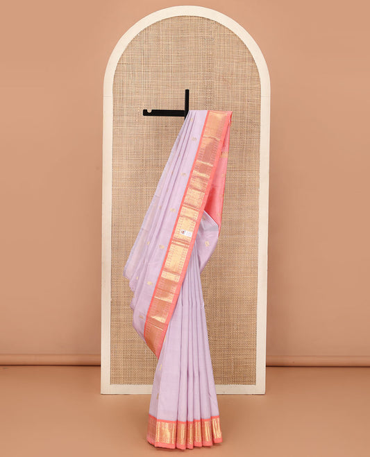 Pastel purple zari buttas Kanchipuram silk saree, contrast one-sided border of laddu kamalam, banras, and mayil kann, and zari design pallu