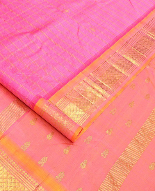 Pink checked and zari buttas Kanchipuram silk saree, contrast one-sided border of paneer sombu, banaras, muthu, and jaal design, and zari design pallu