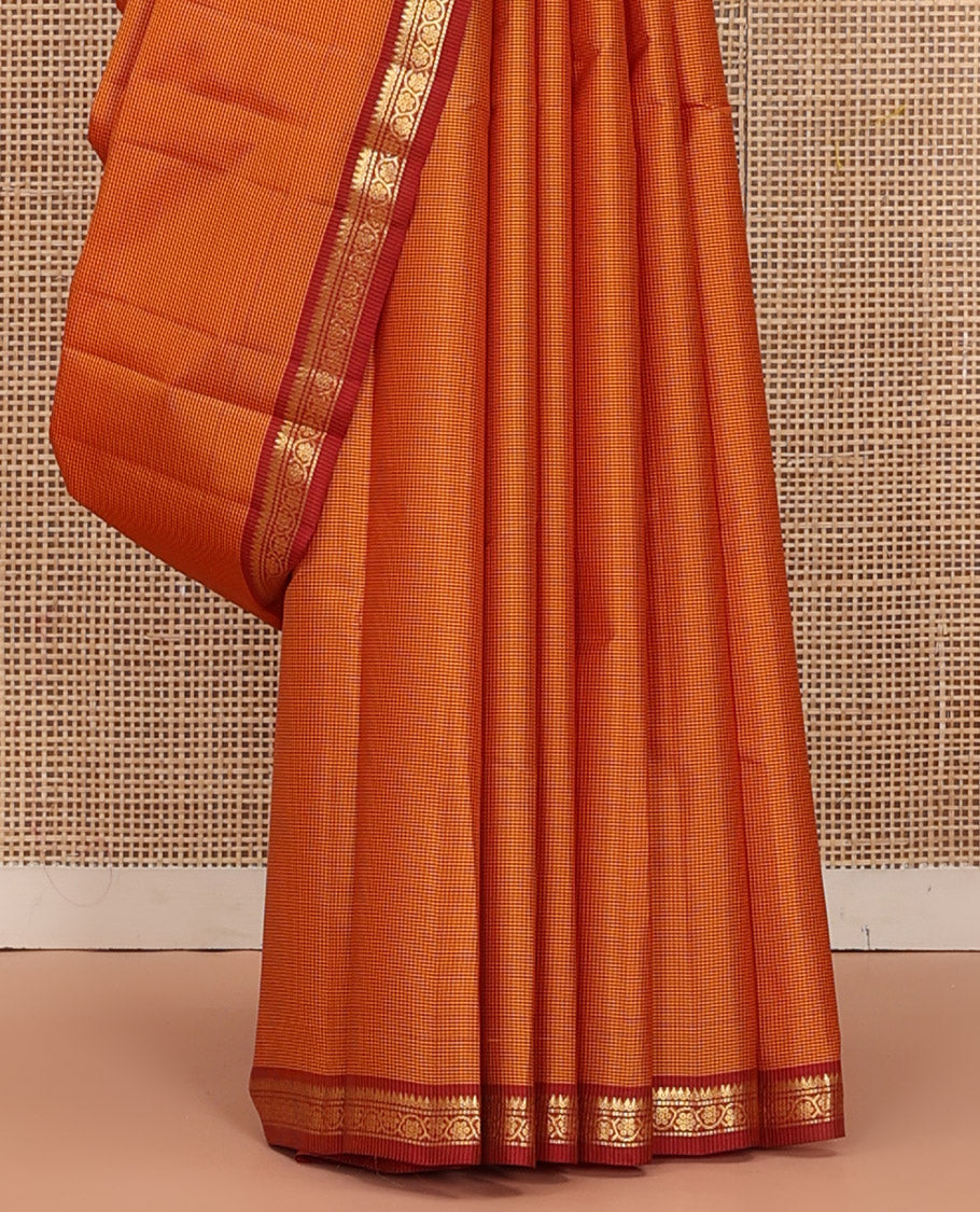 Yellow Kanchipuram Silk Saree Embellished with Kasa Kasa Checks, Adorned with Zari Border Featuring Thilakam Mokku, Muthu, and Kodi Visiry Designs, Sparsely Woven Pallu of Corner Manga Designs, and Paired with a Contrast Blouse