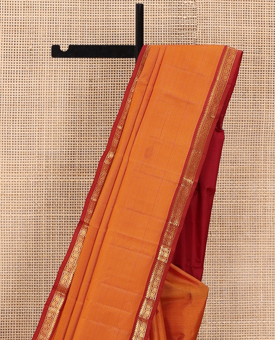 Yellow Kanchipuram Silk Saree Embellished with Kasa Kasa Checks, Adorned with Zari Border Featuring Thilakam Mokku, Muthu, and Kodi Visiry Designs, Sparsely Woven Pallu of Corner Manga Designs, and Paired with a Contrast Blouse