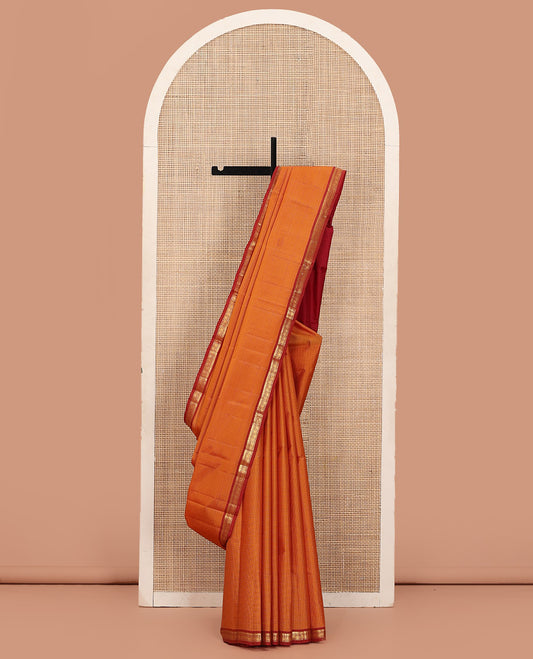 Yellow Kanchipuram Silk Saree Embellished with Kasa Kasa Checks, Adorned with Zari Border Featuring Thilakam Mokku, Muthu, and Kodi Visiry Designs, Sparsely Woven Pallu of Corner Manga Designs, and Paired with a Contrast Blouse