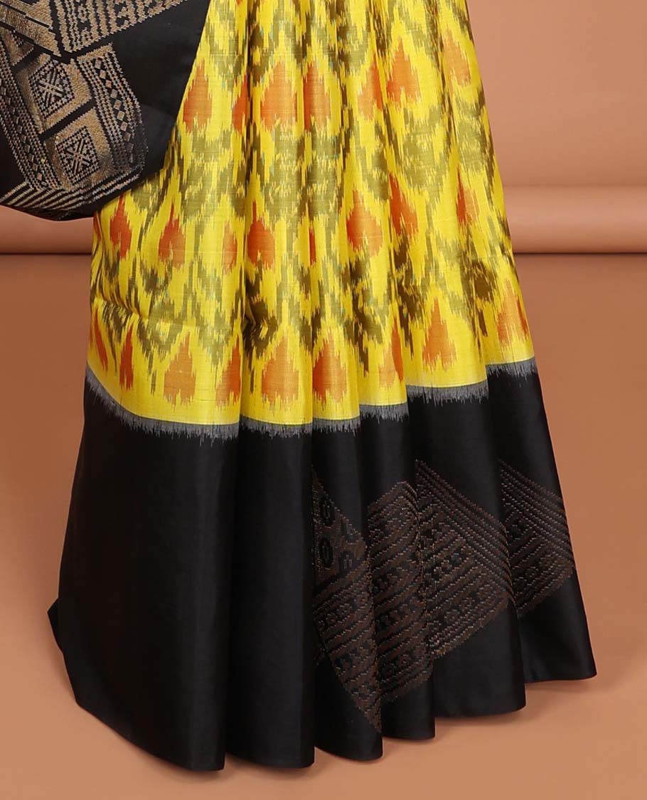 Yellow ikkat style floral vine design soft silk saree with contrast zari border & geometric zari design pallu