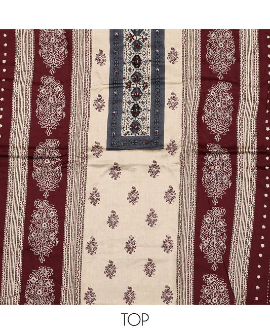 Cream and maroon material chudidar set, block printed with neck work top, contrast plain bottom, and intricately block printed dupatta