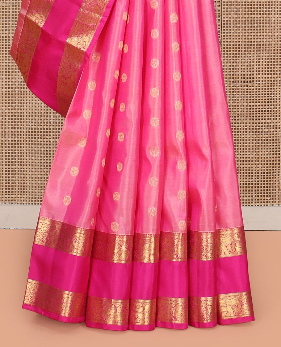 Pink Vasundhara Silk Saree, Subtly Enriched with Zari Buttas All Over Its Body, Complemented by a Contrast Rettai Pettu Border of Kodi Visiry Designs, Grand Geometric Design Pallu, and Paired with a Contrast Blouse