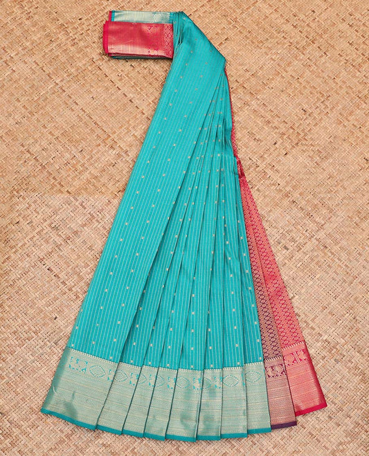 Green Budget Silk Saree, Accentuated With Stripes and Buttas All Over Its Body, Highlighted by Traditional Zari Designs Woven Border, Grand Pallu and Paired with a Contrast Blouse