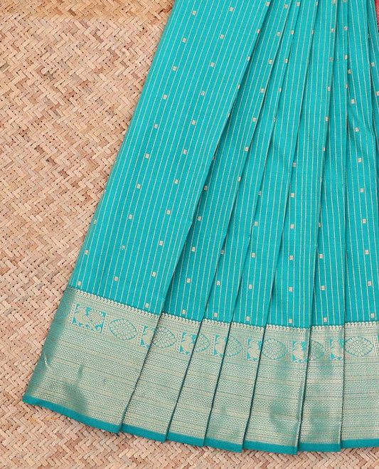Green Budget Silk Saree, Accentuated With Stripes and Buttas All Over Its Body, Highlighted by Traditional Zari Designs Woven Border, Grand Pallu and Paired with a Contrast Blouse