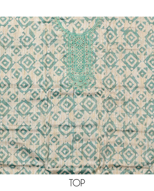 Green material chudidar set, batik style printed with neck embroidered top, contrast plain bottom, and batik printed dupatta