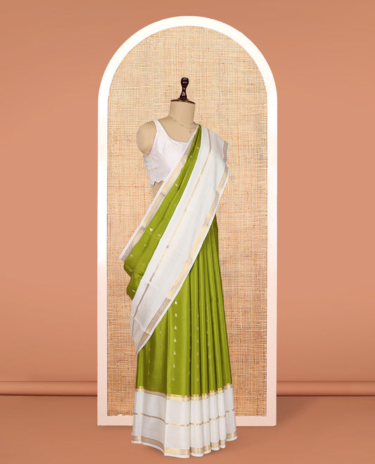 Green Mysore Silk Saree, Finely Crafted with Zari Buttas, Complemented by a Contrast Traditional Zari Border, Grand Temple Pallu, and a Contrast Blouse
