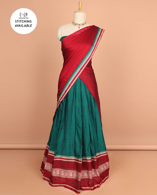 Green cotton half saree with contrast peacock motifs border, plain blouse & plain dhavani with striped design border