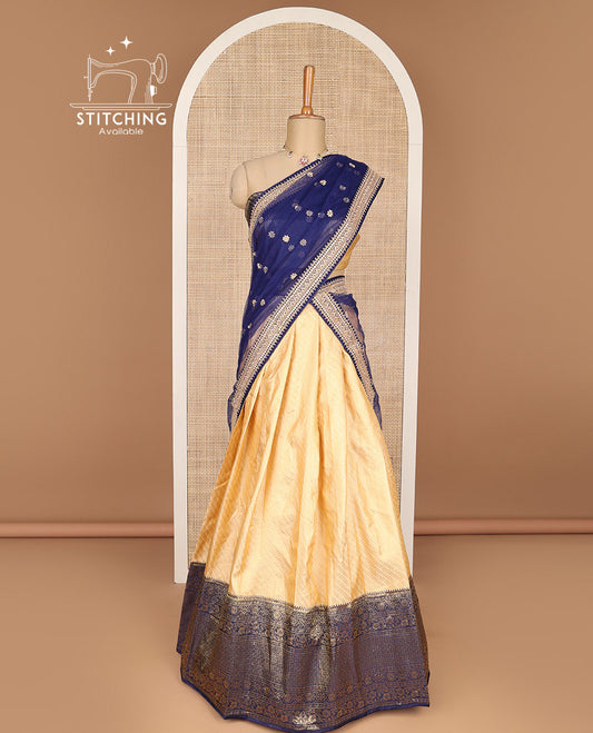 Lifgt yellow striped banaras half saree with contrast zari design border ,leaf vine zari design blouse & floral zari design dhavani