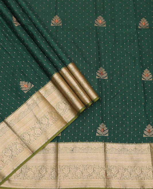 Green Art Silk Pavadai Material Set, Delicately Woven with Zari Buttas on Its Skirt, Complemented by a Contrast Traditional Zari Design Border, and Paired with a Contrast Blouse