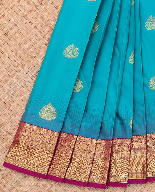Blue Budget Silk Saree, Bedecked with Zari Buttas on Its Body, Complemented by a Contrast Traditional Zari Design Border, Pallu of Chevron Design, and Paired with a Contrast Blouse