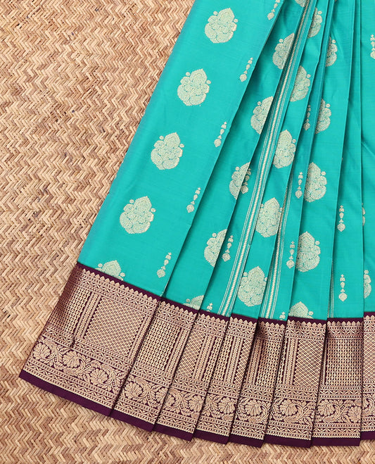 Turquoise Budget Silk Saree, Decked Up with Zari Buttas and Stripes, Complemented by a Contrast Traditional Zari Border, Jaal Pallu, and a Contrast Blouse