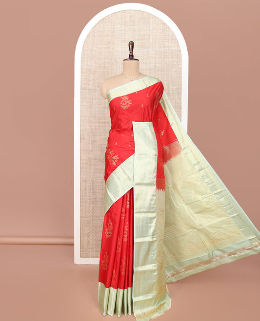Red Budget Silk Saree, Charmingly Accented with Zari Buttas All Over Its Body, Complemented by a Contrast Traditional Zari Design Border of Paisleys, Majestically Zari Detailed Pallu, and Paired with a Contrast Blouse