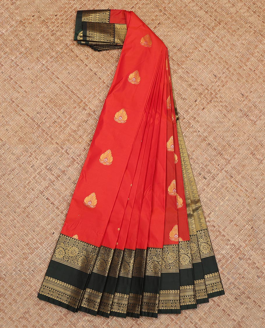 Red Budget Silk Saree, Enlivened with Floral Buttas, a Contrast Rettai Pettu Zari Border, a Grand Pallu and a Contrast Blouse