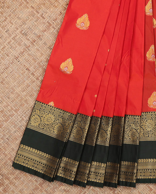 Red Budget Silk Saree, Enlivened with Floral Buttas, a Contrast Rettai Pettu Zari Border, a Grand Pallu and a Contrast Blouse