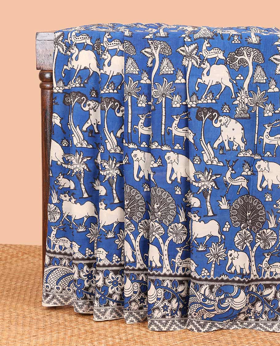 Blue forest theme design machine-printed kalamkari cotton saree with contrast floral design border & pichwai design pallu