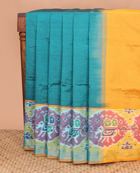 Blue plain poly cotton saree, contrast patola round elephant motifs border, and plain pallu