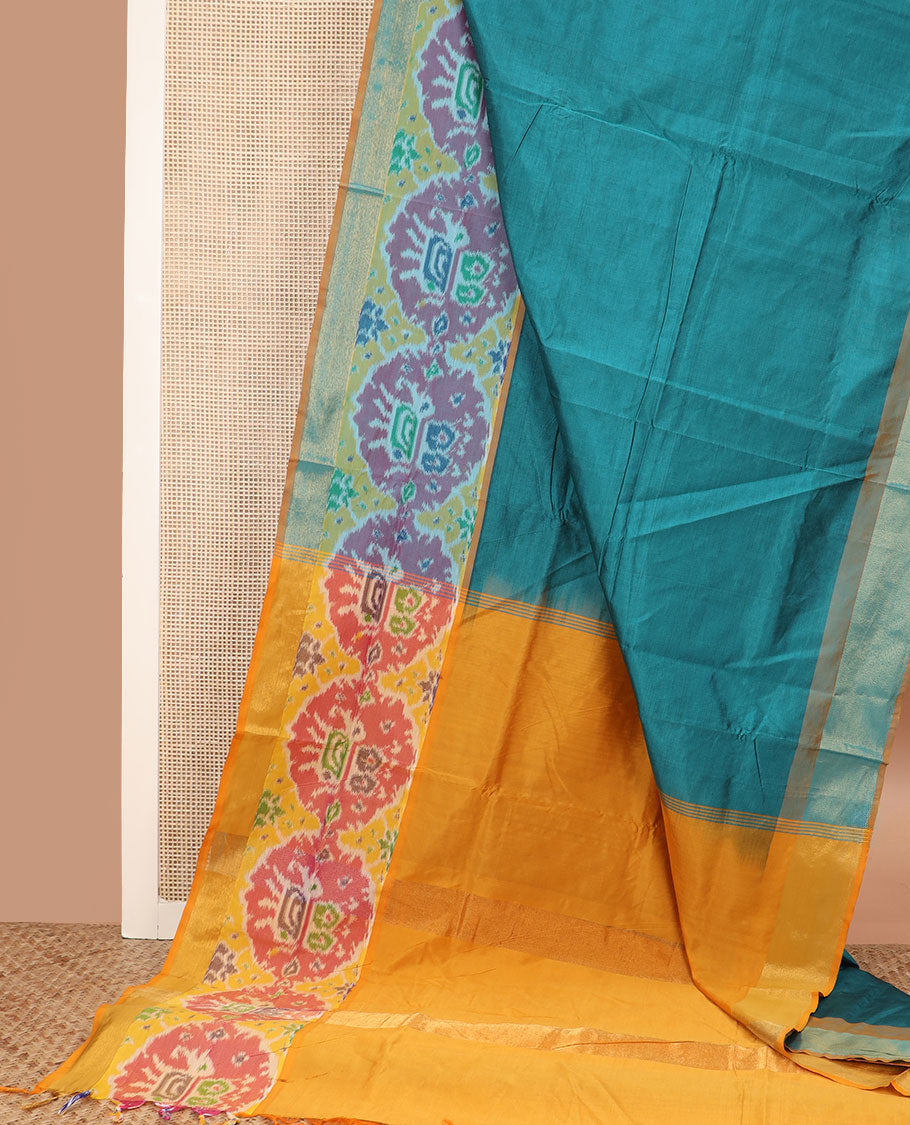 Blue plain poly cotton saree, contrast patola round elephant motifs border, and plain pallu