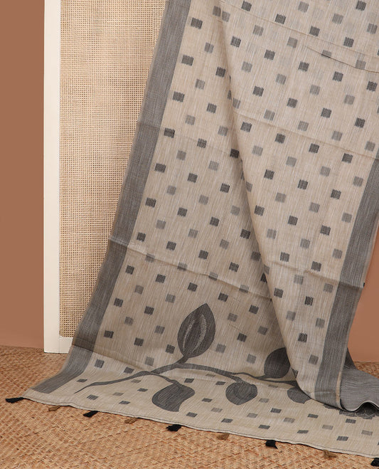 Light grey square buttas woven cotton saree, contrast plain border and pallu features a pink flower with stem motifs