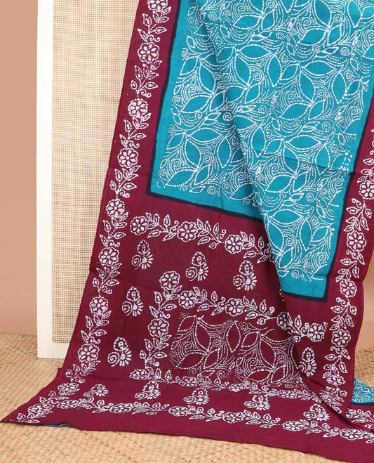 Blue batik printed sungudi cotton saree, contrast floral batik border, and batik floral pallu
