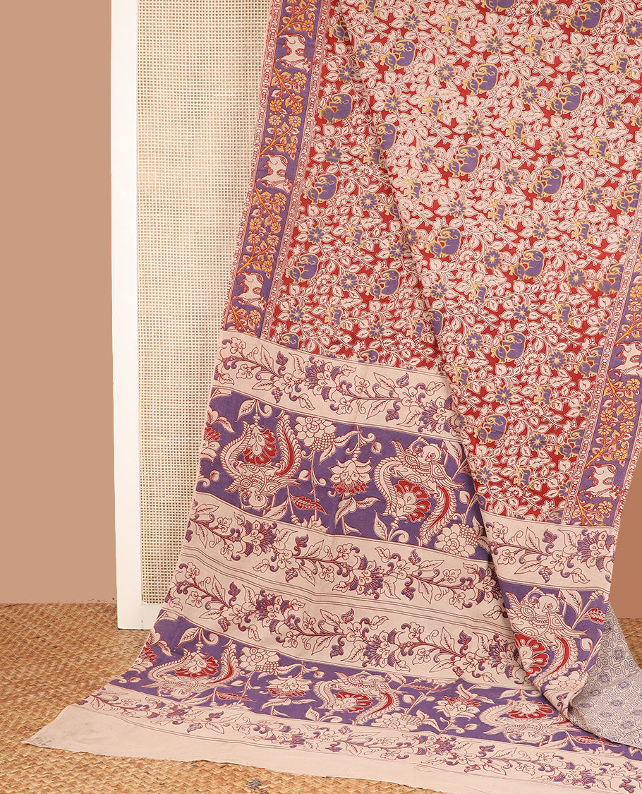 Red floral and elephant machine-printed cotton saree, contrast floral and Pichwai cow border, and pallu of floral and peacock print