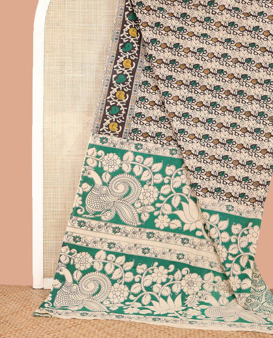Black Machine-Printed Kalamkari Cotton Saree, Highlighted by Batik-Style Leaf Printed on Its Body, Batik Paisley Printed Border, Pallu of Floral and Peacock Print, and Paired with a Printed Blouse