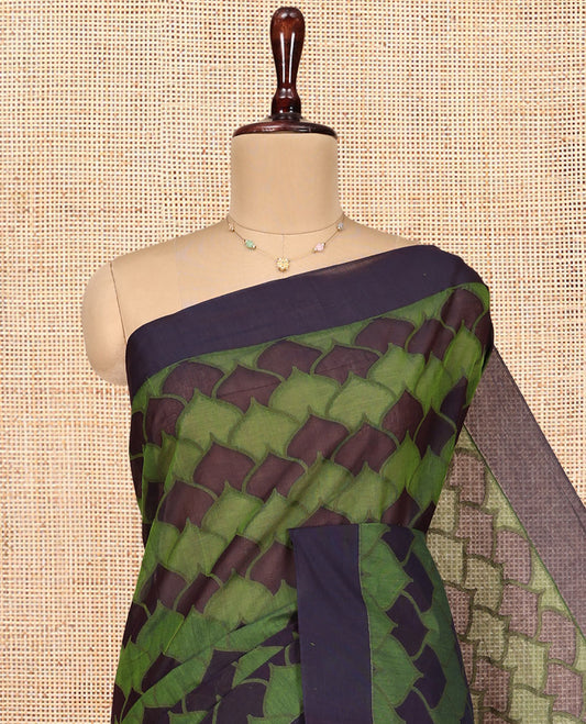Green Coimbatore Cotton Saree, Ornamented with Scallop Design on Its Body, a Contrast Plain Border, Pallu of Floral Creeper, and Stripes, and Paired with Contrast Blouse