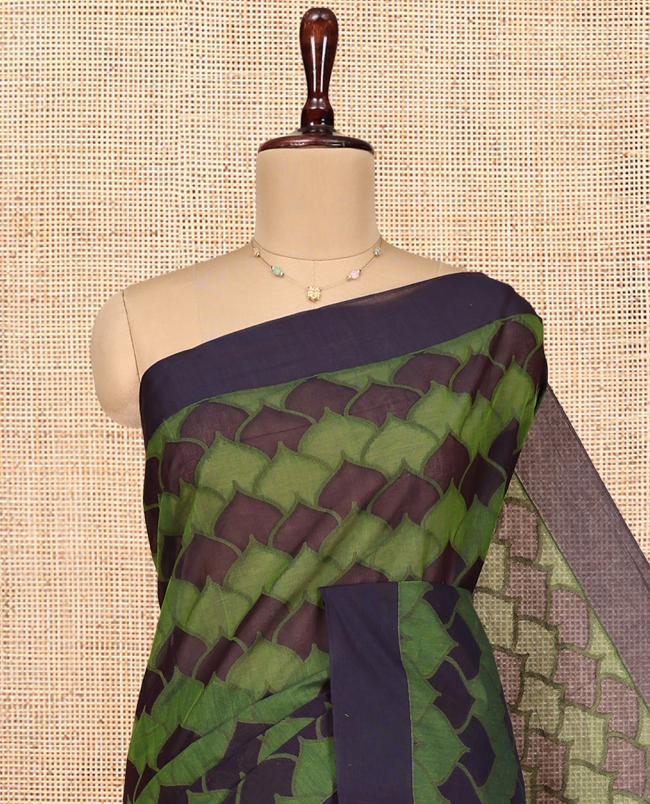 Green Coimbatore Cotton Saree, Ornamented with Scallop Design on Its Body, a Contrast Plain Border, Pallu of Floral Creeper, and Stripes, and Paired with Contrast Blouse