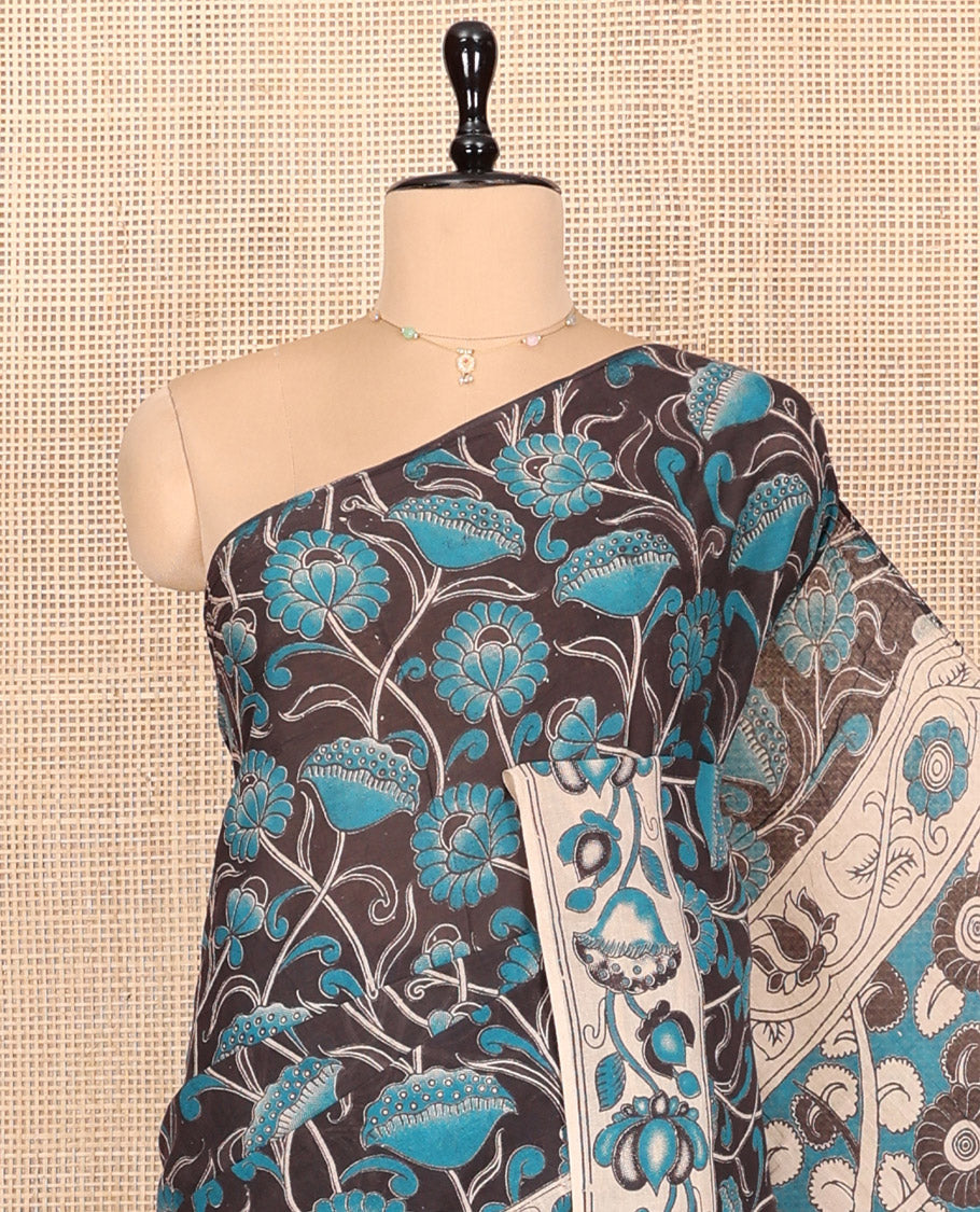 Black Kalamkari Cotton Saree, Impeccably Styled with Floral Vine Print, Contrast Floral Printed Border, Pallu of Peacock Motifs, and a Matching Blouse