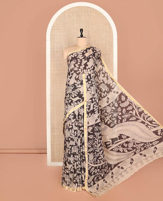 Black Machine-Printed Kalamkari Cotton Saree Features Flora-Fauna Motifs, a Piping Border, Pallu of Peacock Motifs, and a Matching Blouse
