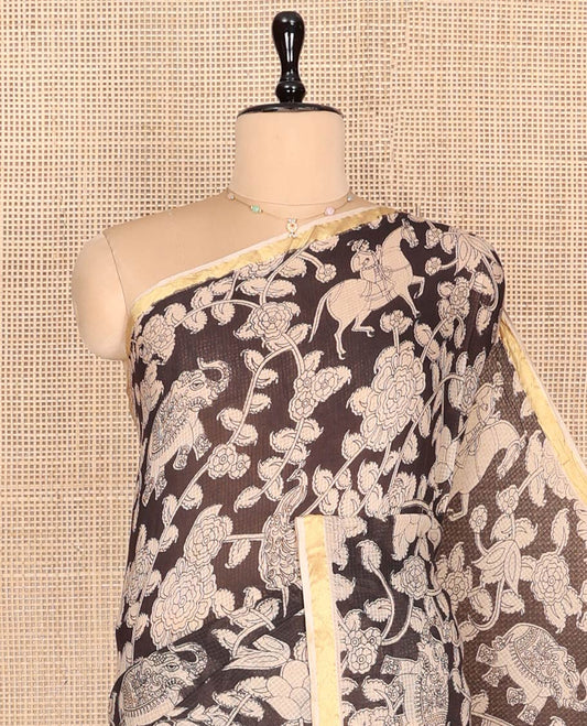 Black Machine-Printed Kalamkari Cotton Saree Features Flora-Fauna Motifs, a Piping Border, Pallu of Peacock Motifs, and a Matching Blouse