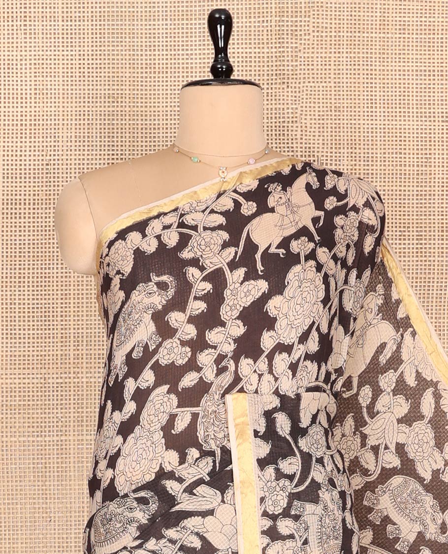 Black Machine-Printed Kalamkari Cotton Saree Features Flora-Fauna Motifs, a Piping Border, Pallu of Peacock Motifs, and a Matching Blouse