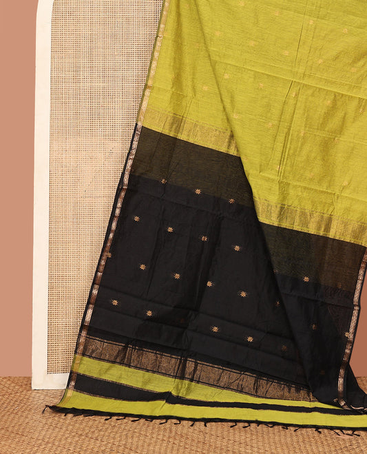 Black Maheshwari Cotton Saree, Uniquely Woven with Flower Buttas All Over Its Body, Subtly Woven Piping Border, Captivating Contrast Pallu Steeped with Buttas, and Paired with a Contrast Blouse