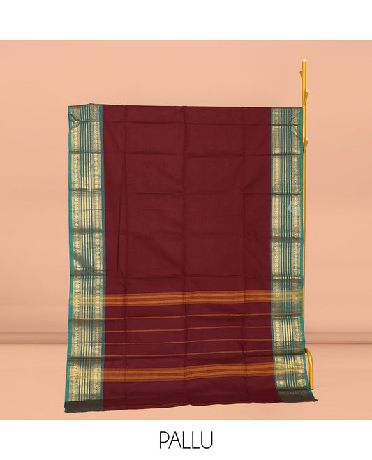 Maroon Plain Chettinad Cotton Saree, Complemented by Contrast Traditional Zari Design Border, Striped Pallu, and Paired with Matching Blouse