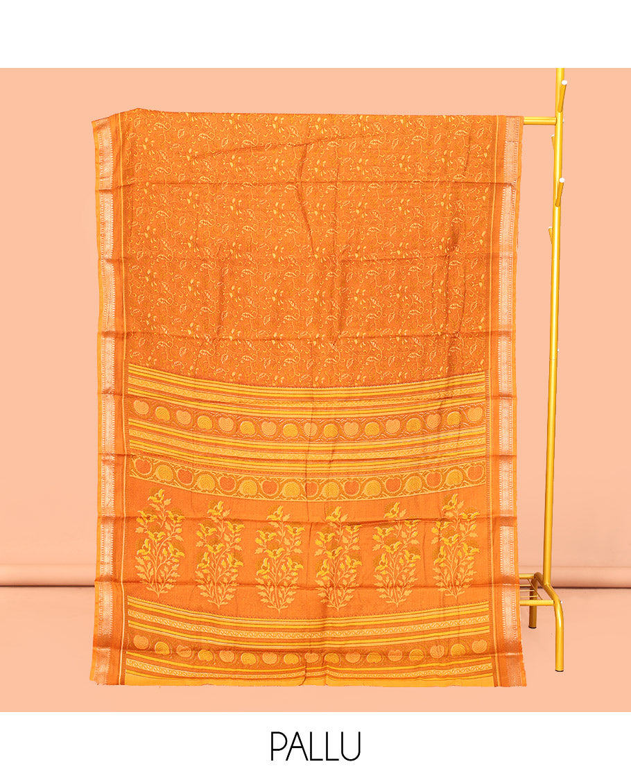 Orange Mul Mul Cotton Saree, Detailed with Leaf Print, a Subtle Traditional Border, a Floral-Printed Pallu, and a Matching Blouse