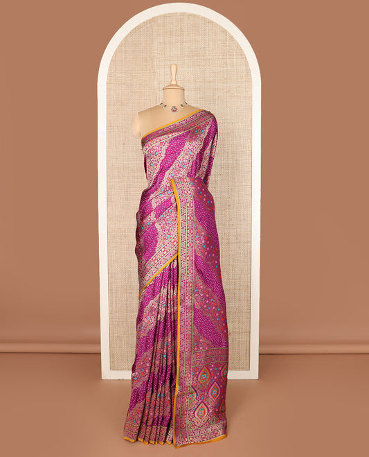 Purple bandhani dottes and meenakari floral-paisley design dola silk saree, self-border, and pallu of meenakari floral-paisley designs