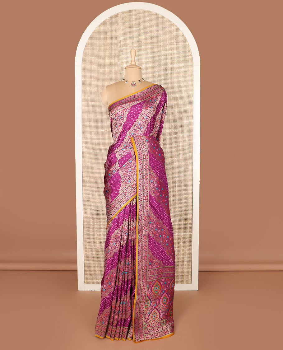 Purple bandhani dottes and meenakari floral-paisley design dola silk saree, self-border, and pallu of meenakari floral-paisley designs