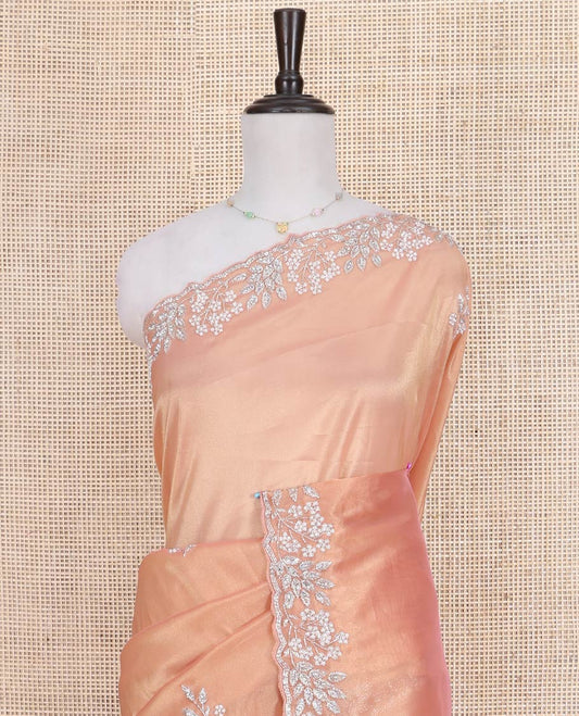 Peach Designer Saree, Beautifully Bedecked with Stone-Embroidered Buttas on Its Body, Highlighted by a Scallop Floral-Themed Embroidered Border, Self-Pallu, and Paired with a Matching Blouse