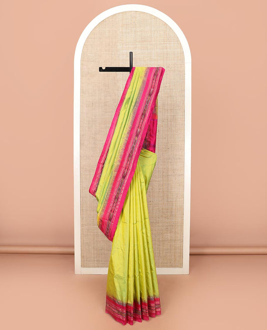Green Plain Ikkat Silk Saree with a Contrast Rani Pink Border Accentuated by a Hazy Ikkat Weave, Featuring a Pallu Flanked by Stripes and Ikkat Texture