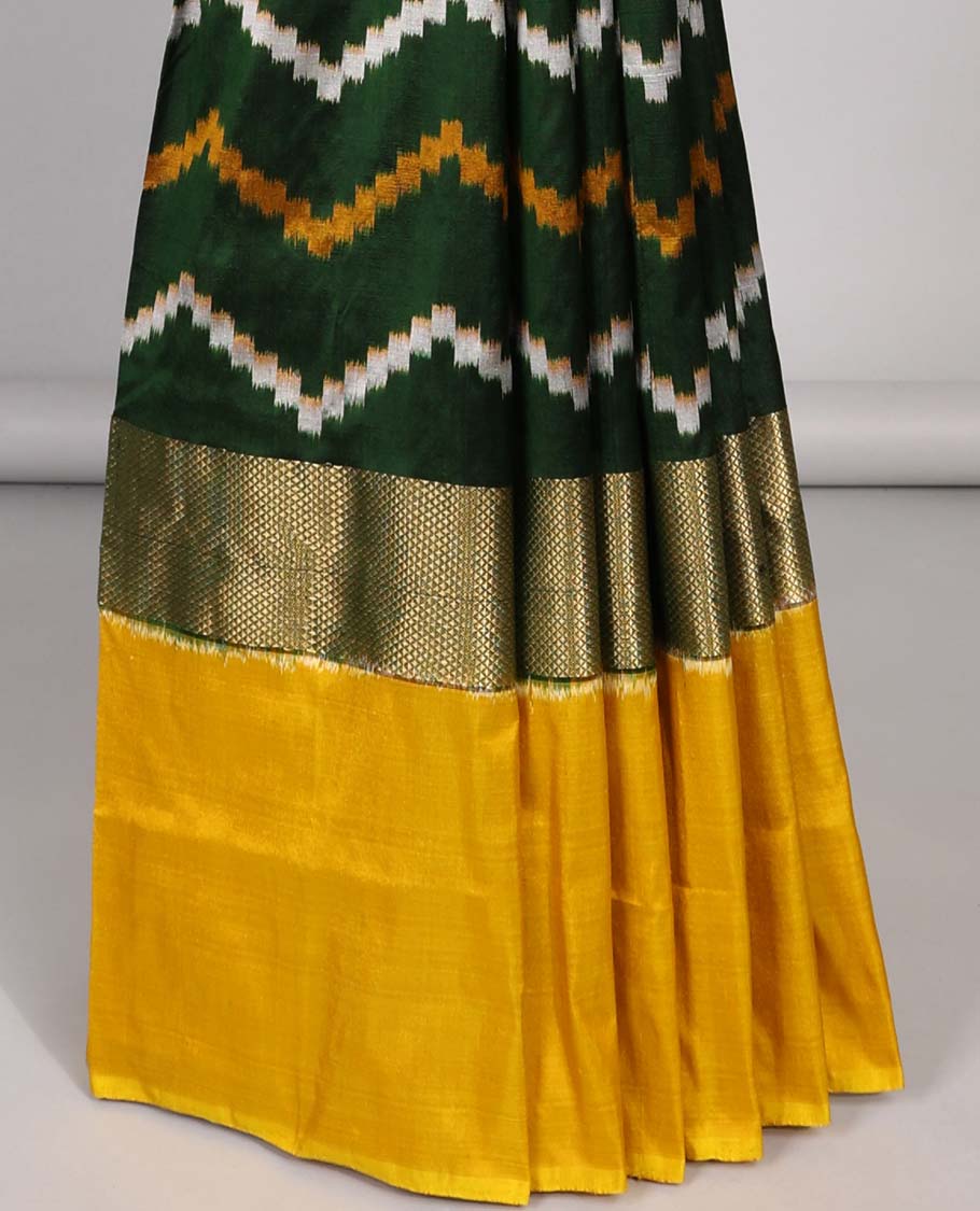 Green striped ikkat silk saree with contrast zari border & ogee design pallu