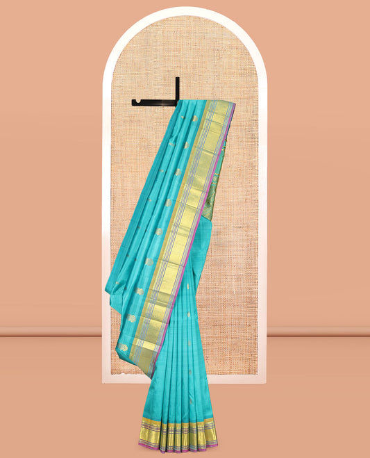 Blue Kanchipuram Silk Saree, Woven with Zari Buttas, a Contrast One-Sided Border of Panner Sombu, Banaras, Muthu, and Jaal Designs, Kodi Visiry Pallu, and a No Blouse