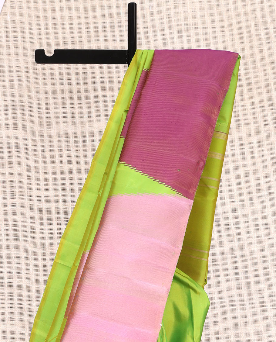Borderless Green Kanchipuram Silk Saree, Complemented by a Thazampoo Reku Design, Seppu Rekku Pallu, and Matching Blouse