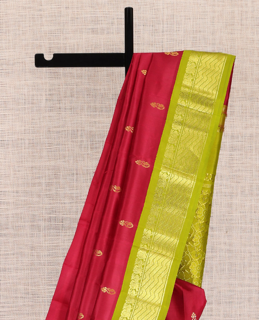 Light Maroon Kanchipuram Silk Saree, Detailed with Zari Buttas, a Contrast Korvai One-sided Border of Mayil, and Strip Designs, Pallu of Floral Designs, and No Blouse