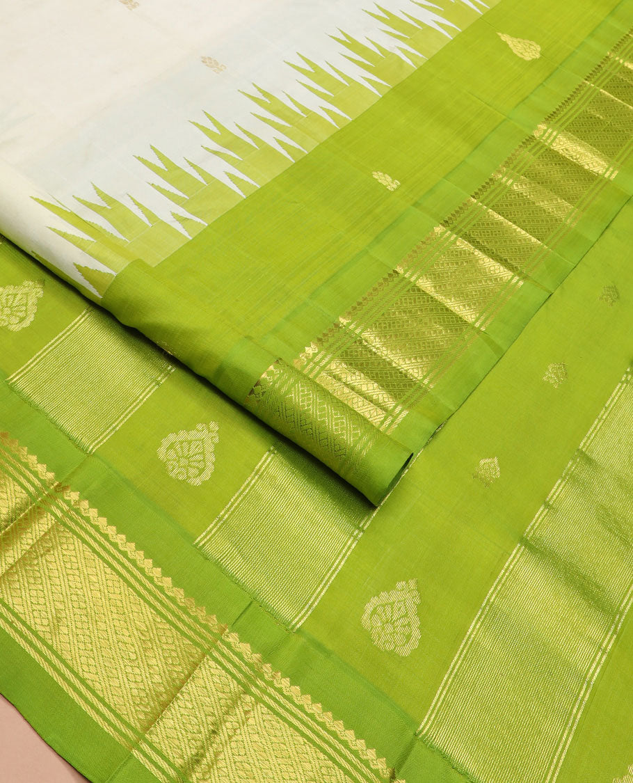 Cream zari buttas Kanchipuram silk saree, contrast thazampoo rekku border of zari designs, and zari design pallu