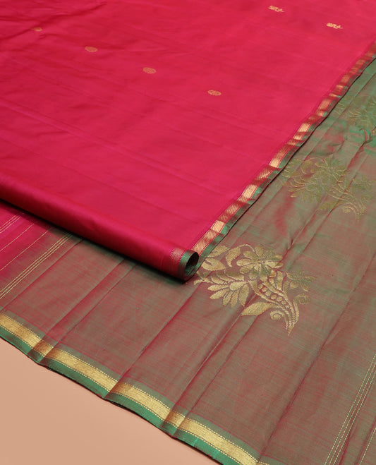 Red Kanchipuram Silk Saree Elevated with Zari Buttas, Features Contrast Zari Piping Border, Subtly Woven Contrast Pallu with Floral Designs, and Paired with a Contrast Blouse