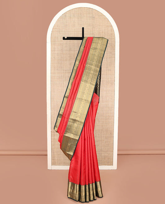 Red Kanchipuram Silk Saree, Woven with Geometric Patterns All Over Its Body, Complemented by Contrast Border of Thilakam Mokku, Kathir, Vanki, Banaras, Laddu Kamalam, and Mayil Designs, a Meticulously Crafted Pallu, and Paired with a Contrast Blouse
