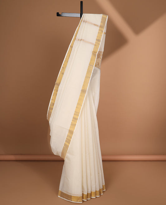 Cream kerala saree with zari designs, zari border & pallu of intricate zari designs