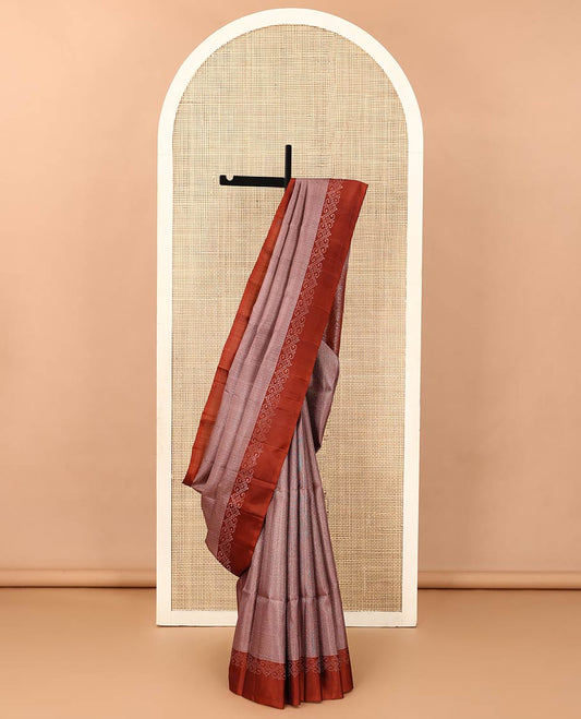 Brown geometric patterned soft silk saree, contrast unique design border, and pallu of jaal design
