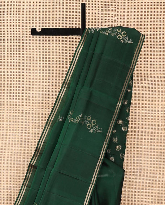 Green Mayuri Soft Silk Saree, Beautified with Floral Buttas All Over Its Body, Subtle Striped Border, Pallu Steeped with Geometric Designs, and Paired with a Matching Blouse